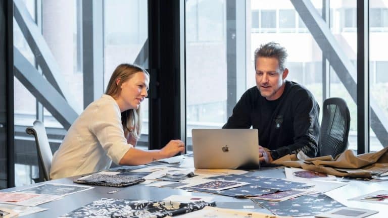 Sales meeting in an open-plan office