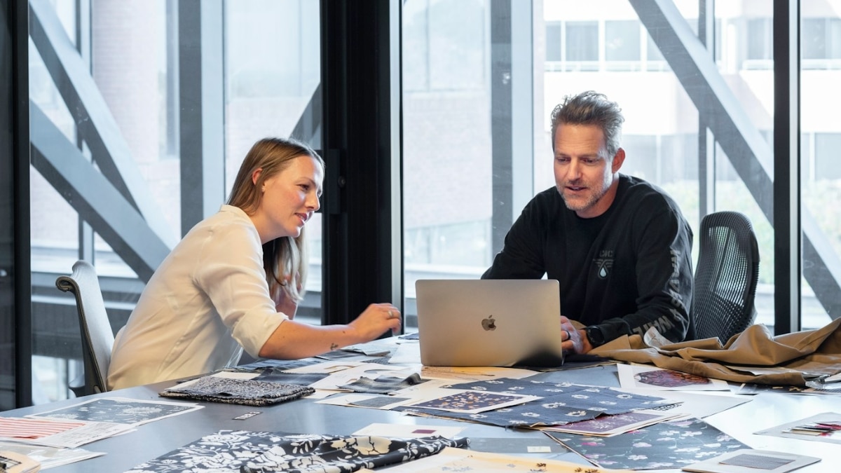 Sales meeting in an open-plan office